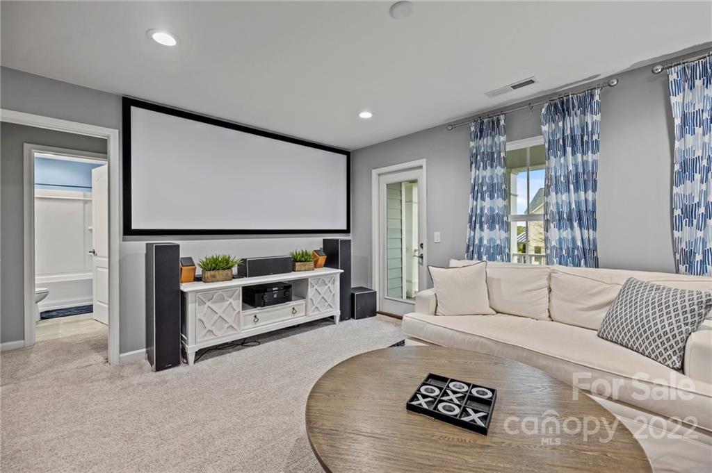 270 Hampton Trail Drive Fort Mill, SC 29708 - Photo 26 of 42 a living room with furniture and a flat screen tv