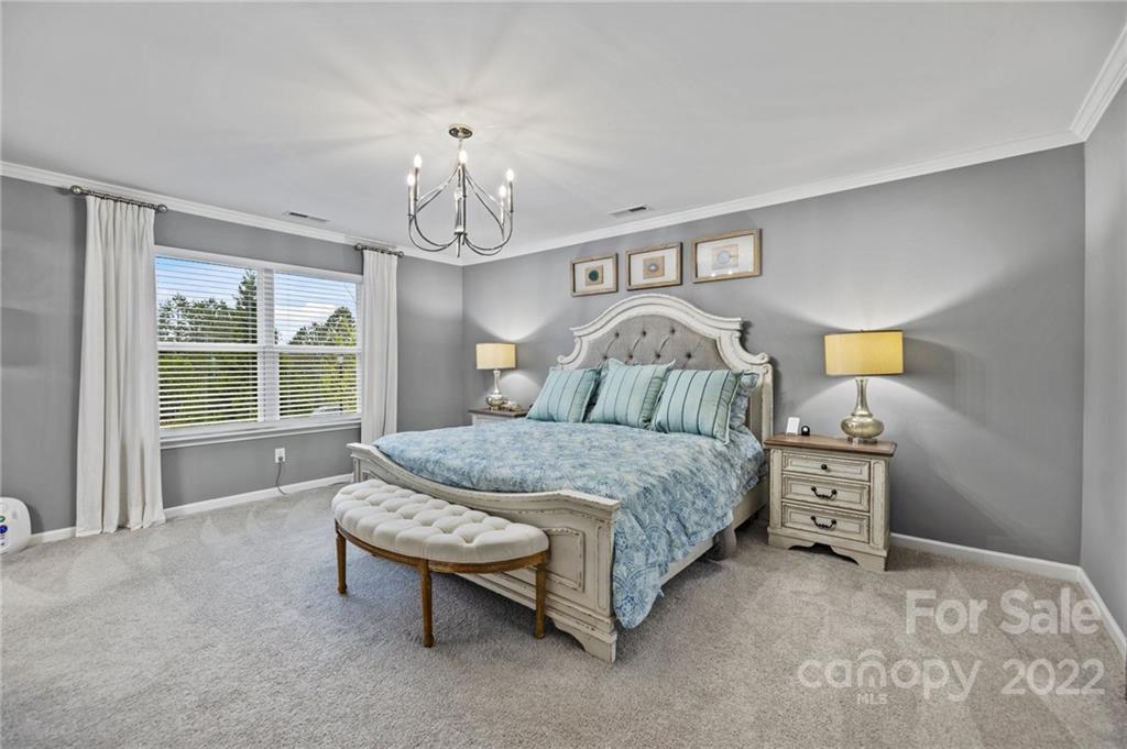 270 Hampton Trail Drive Fort Mill, SC 29708 - Photo 33 of 42 a bedroom with a bed couch and a window