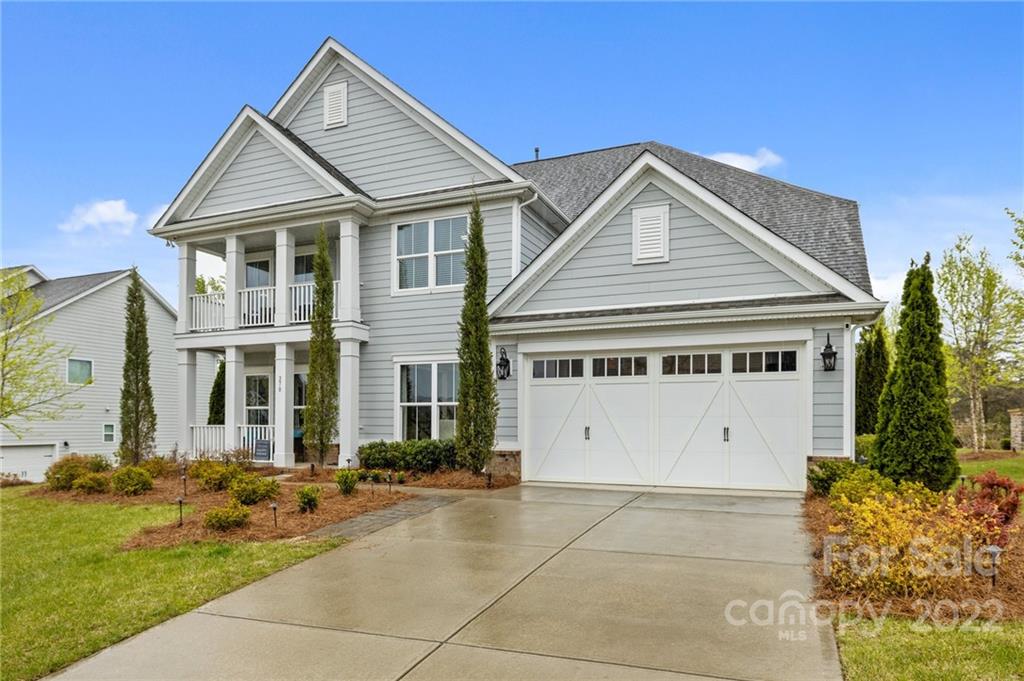 270 Hampton Trail Drive Fort Mill, SC 29708 - Photo 42 of 42 a front view of a house with a garden and plants