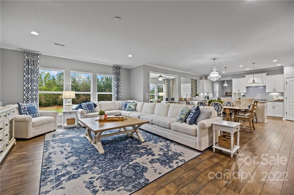 270 Hampton Trail Drive Fort Mill, SC 29708 - Photo 10 of 42 a living room with furniture wooden floor and a large window