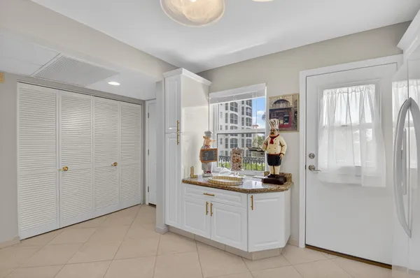 a bed room with a bed and a window