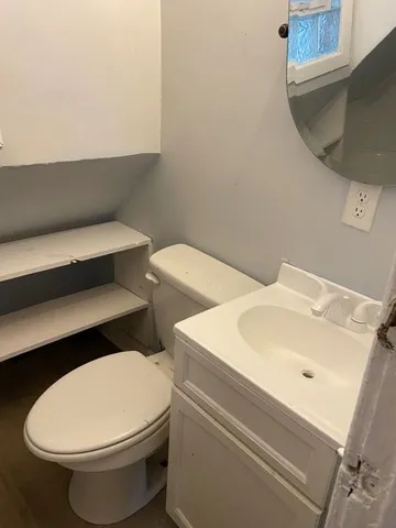 a bathroom with a sink and a toilet
