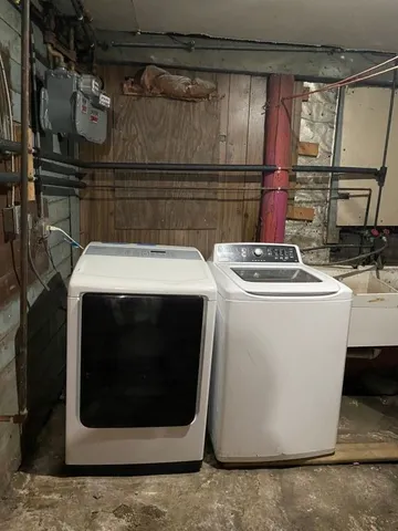 a utility room with dryer and washer