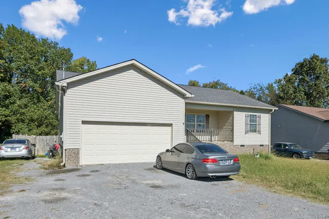 a house view with a backyard space