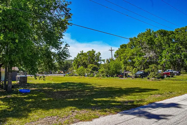 a view of a golf course with a lake