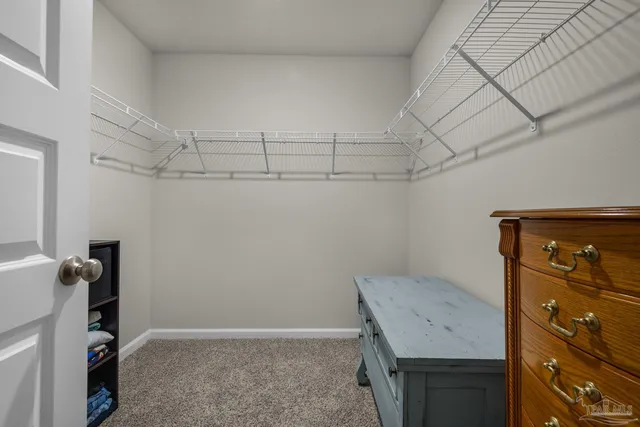 a view of a storage & utility room with closet