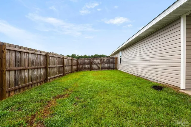 a view of a backyard with a garden