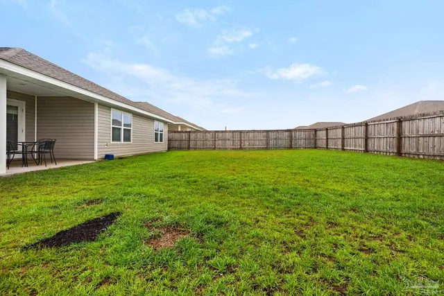 a view of a backyard with a garden