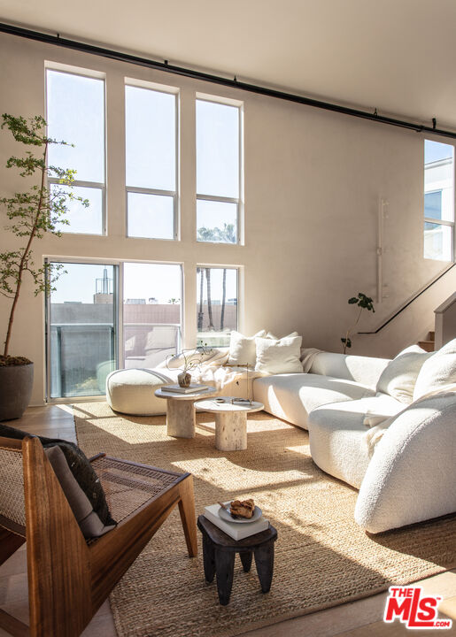 4215 Glencoe Avenue, Unit 405 Marina del Rey, CA 90292 - Photo 14 of 45 a room with furniture and a large window