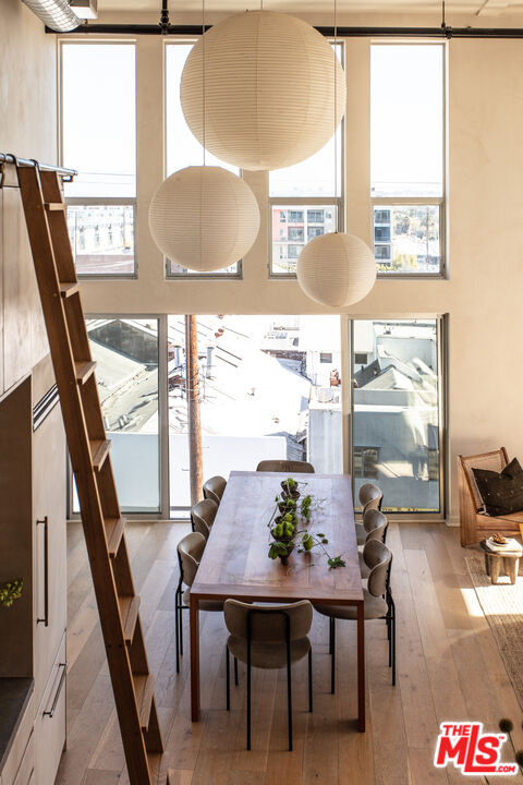 4215 Glencoe Avenue, Unit 405 Marina del Rey, CA 90292 - Photo 15 of 45 a view of a dining room with furniture window and outside view