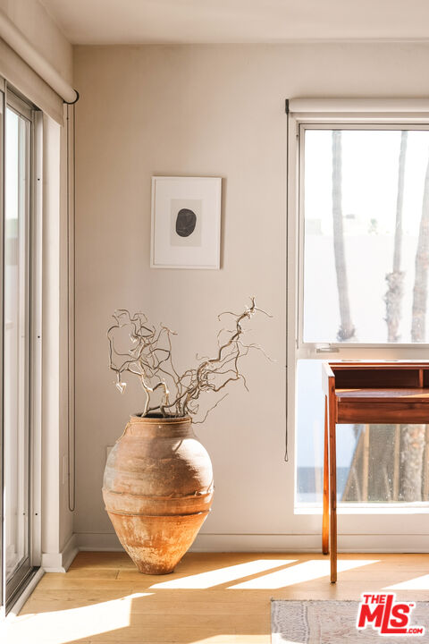 4215 Glencoe Avenue, Unit 405 Marina del Rey, CA 90292 - Photo 29 of 45 a vase of flowers sitting next to a window