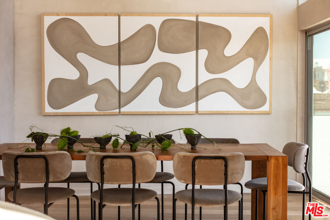 4215 Glencoe Avenue, Unit 405 Marina del Rey, CA 90292 - Photo 3 of 45 a view of a dining room with furniture and wooden floor