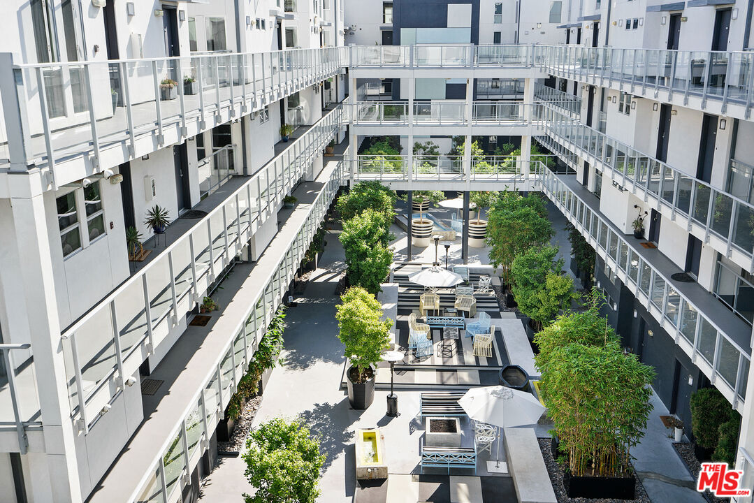 4215 Glencoe Avenue, Unit 405 Marina del Rey, CA 90292 - Photo 36 of 45 a view of building with yard