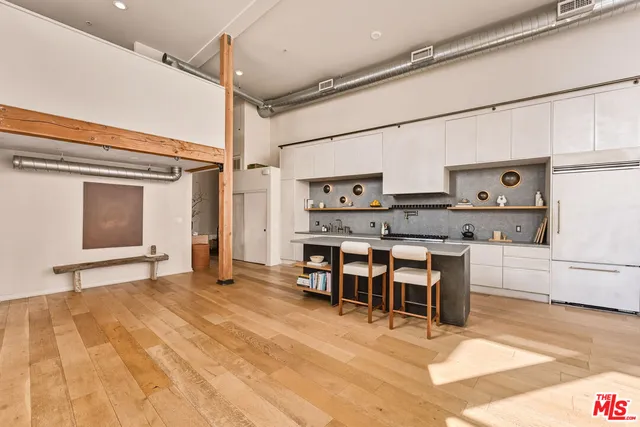a view of a kitchen and dining room