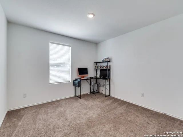 a bedroom with a bed