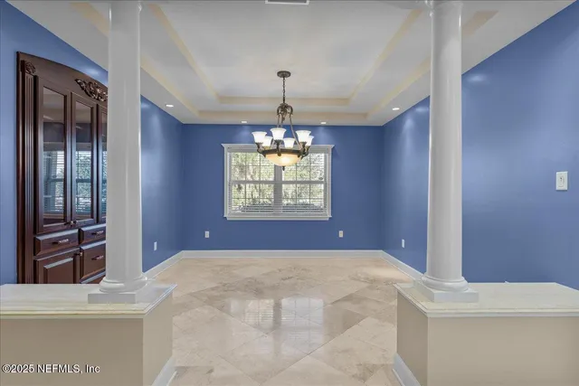 a view of a chandelier in a room