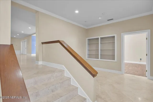 an empty room with a empty space and window