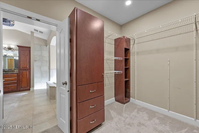a view of a kitchen and a chandelier