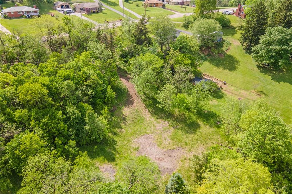 4266 Battle Ridge Road McDonald, PA 15057 - Photo 18 of 23 a view of a big yard with plants and garden