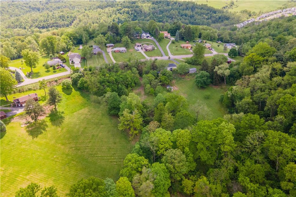 4266 Battle Ridge Road McDonald, PA 15057 - Photo 10 of 23 a view of a lake with a house