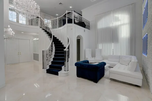 a living room with couches and furniture