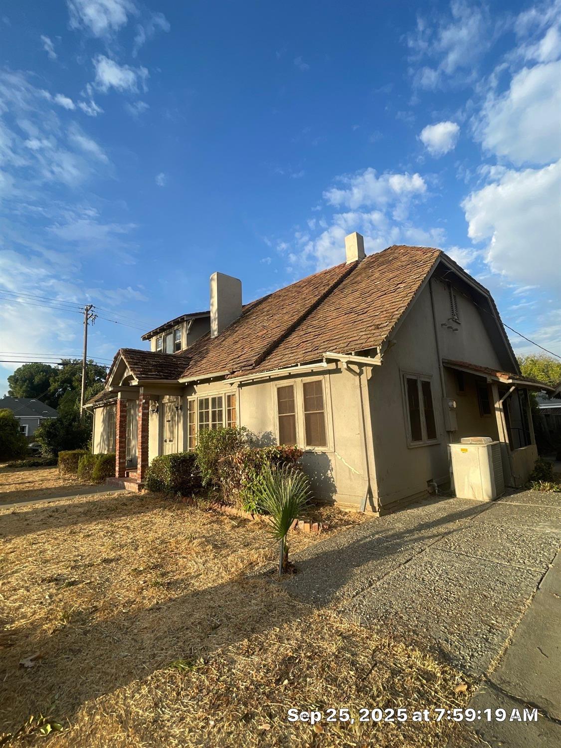 151 South Murdock Avenue Willows, CA 95988 - Photo 2 of 19 a front view of a house with garden