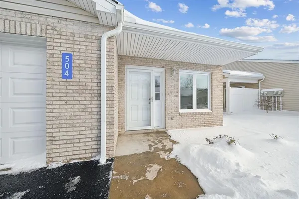 a view of a house with a patio