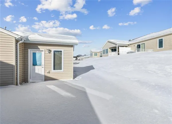 a view of a backyard of the house