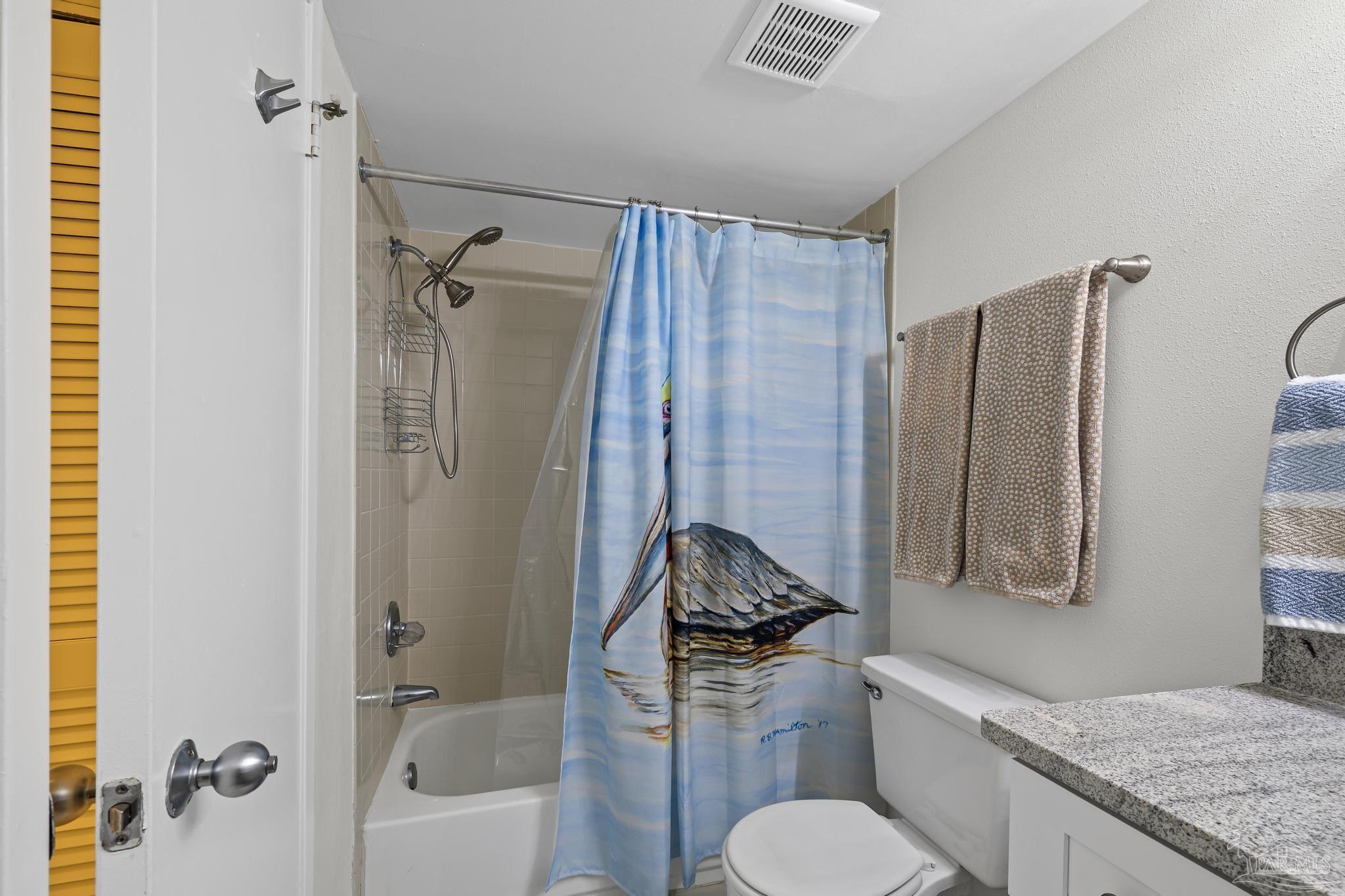 14100 River Road, Unit 112A Pensacola, FL 32507 - Photo 30 of 64 a bathroom with a granite countertop sink toilet and shower