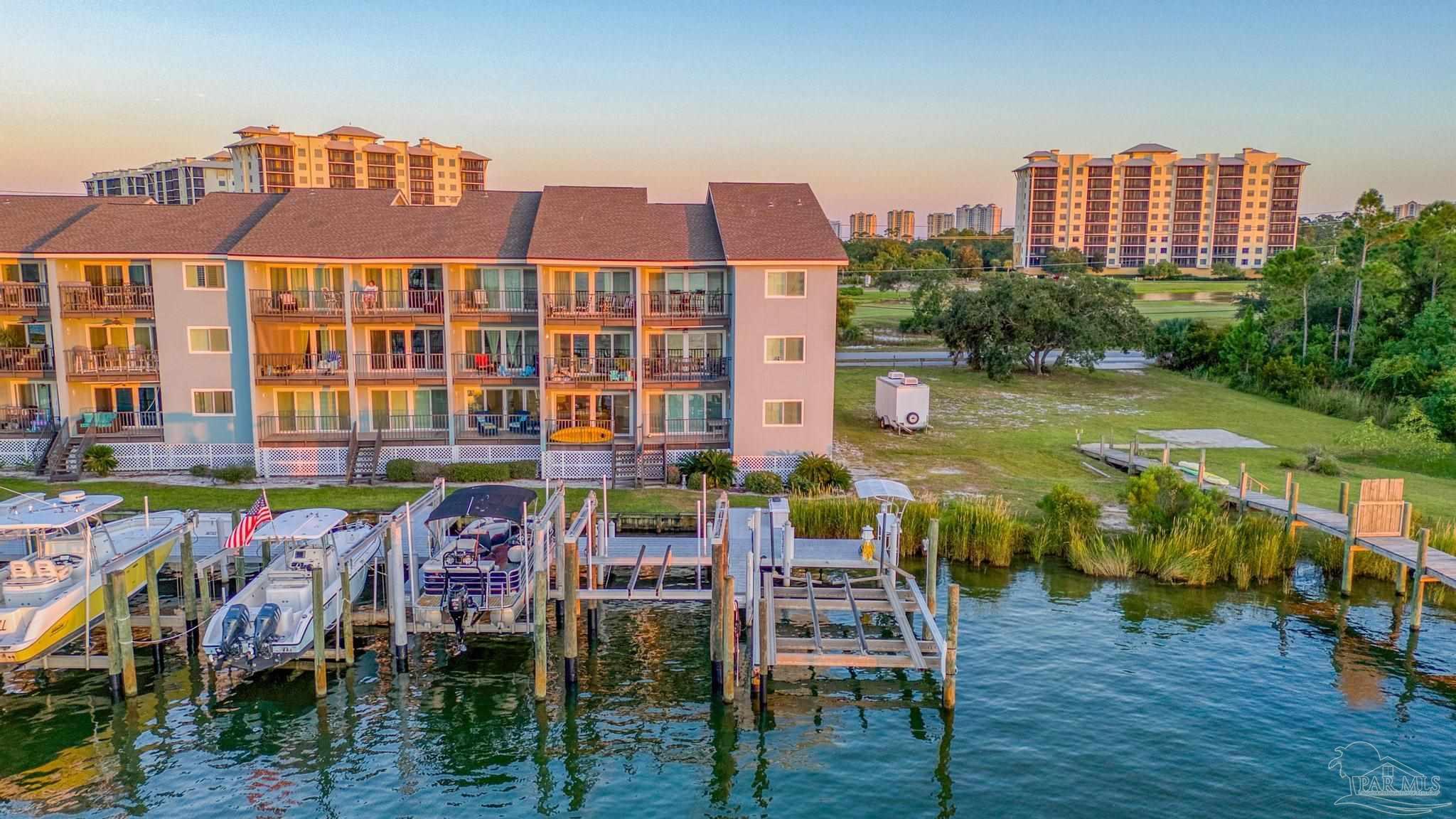 14100 River Road, Unit 112A Pensacola, FL 32507 - Photo 54 of 64 a view of a city that has tall buildings