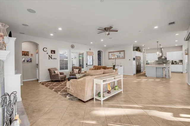 a living room with furniture and a window