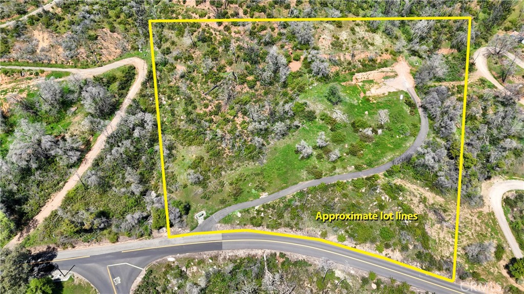 4632 Triangle Road Mariposa, CA 95338 - Photo 23 of 26 a view of a swimming pool with a garden and trees