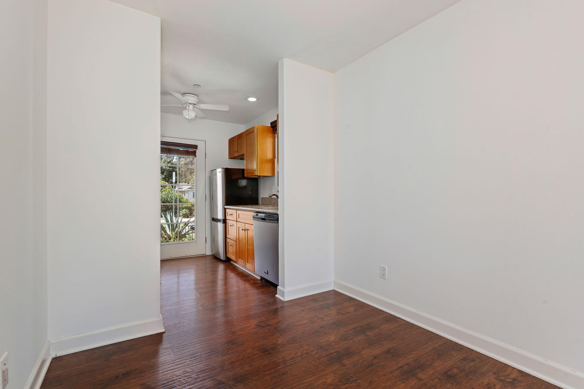 330 West Canon Perdido Street Santa Barbara, CA 93101 - Photo 9 of 44 a view of a kitchen from a hallway