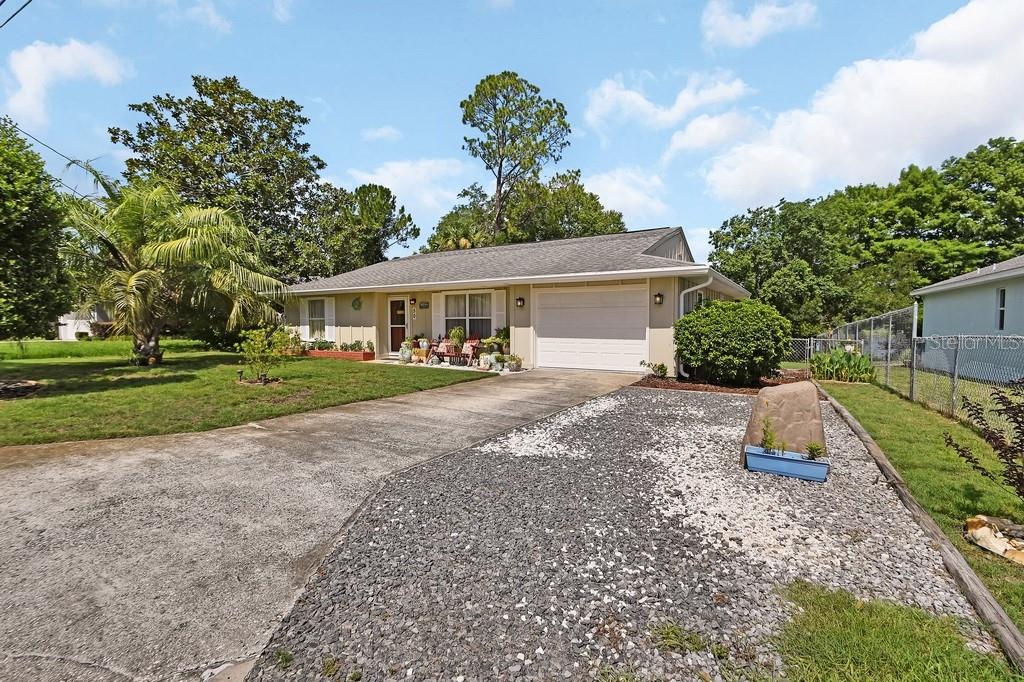 50 Bonita Road DeBary, FL 32713 - Photo 33 of 43 a front view of a house with garden