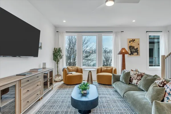 a view of a entryway door with wooden floor