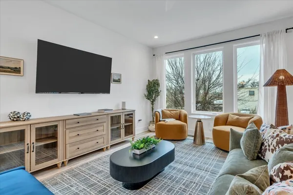 a bed room with a bed and a mirror