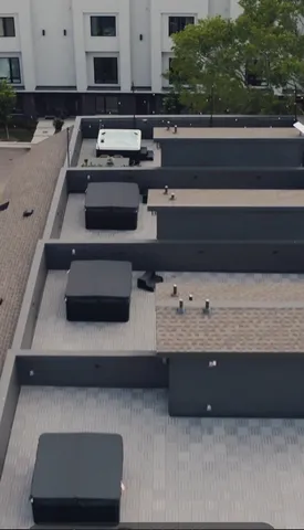 a view of living room with furniture and potted plant