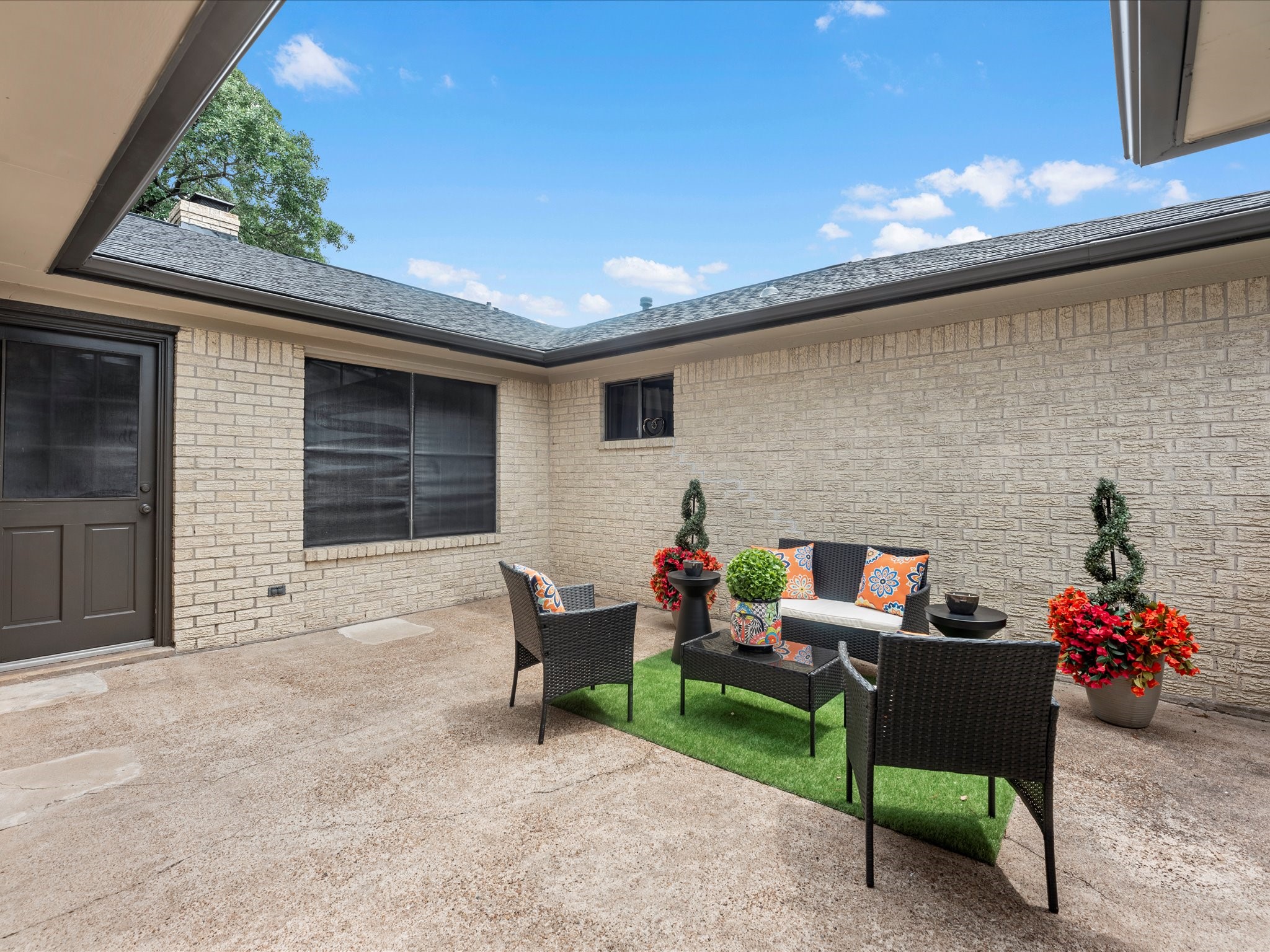 4002 Cujanes Street Pasadena, TX 77504 - Photo 23 of 26 a backyard of a house with table and chairs