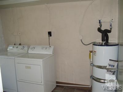 1084 Alta Vista Road Simi Valley, CA 93063 - Photo 8 of 9 a bathroom with a sink and a mirror