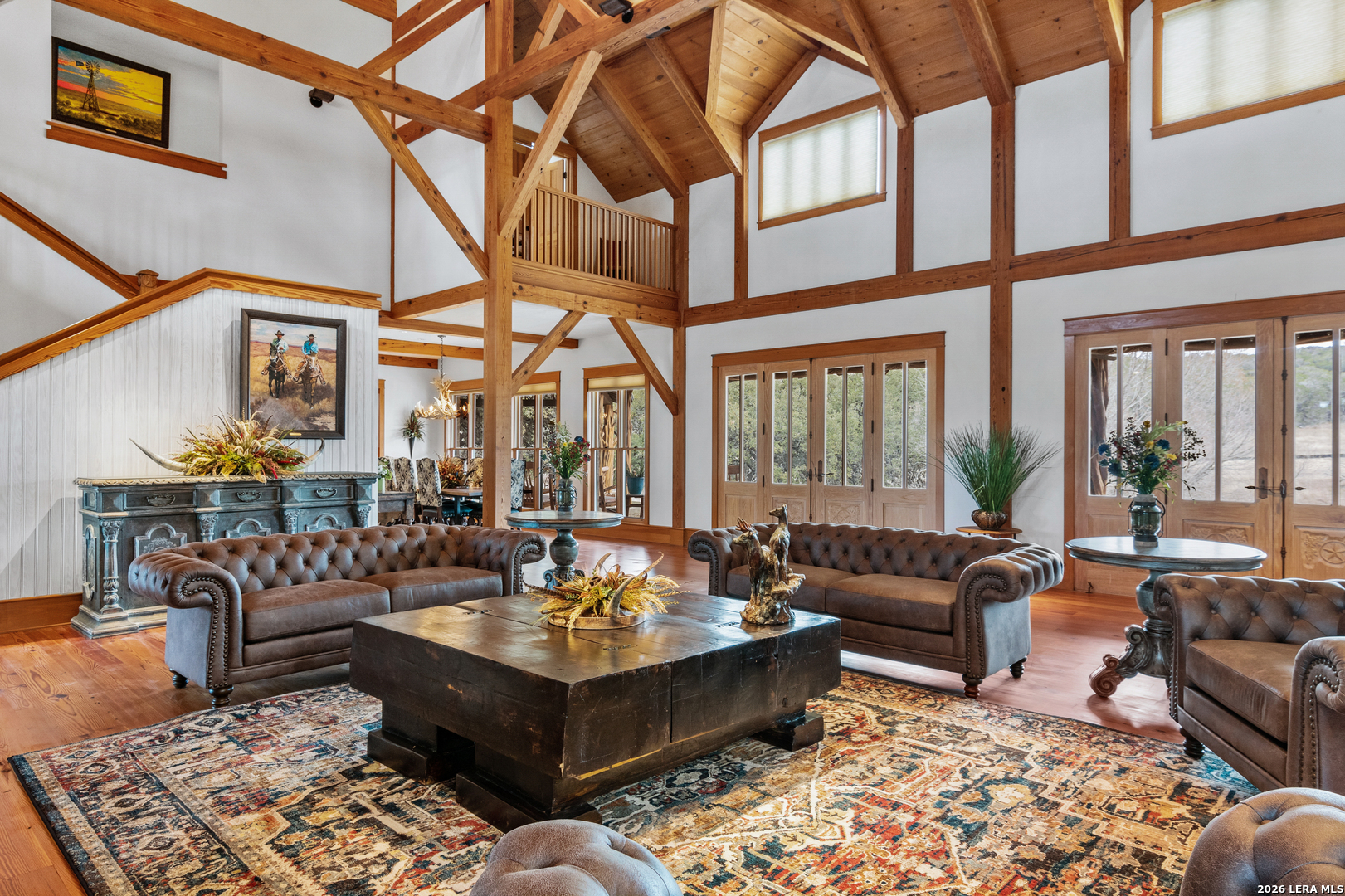 730 Eagle Ridge Road Center Point, TX 78010 - Photo 18 of 50 a living room with fireplace furniture and a rug