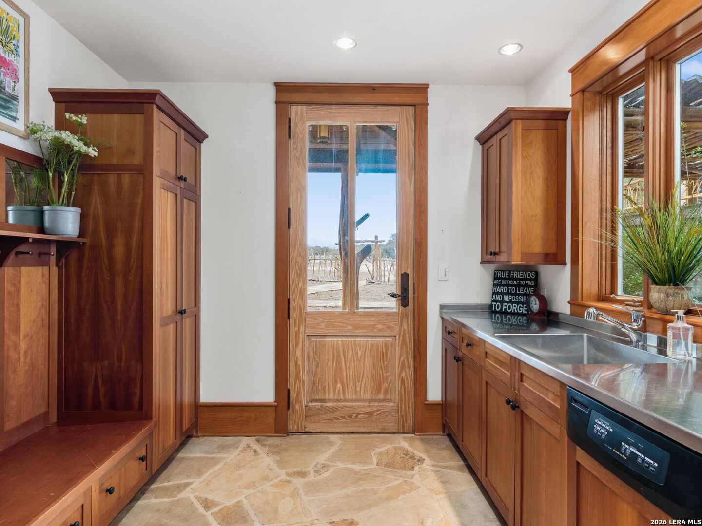 730 Eagle Ridge Road Center Point, TX 78010 - Photo 19 of 50 a kitchen with stainless steel appliances granite countertop a refrigerator and a sink