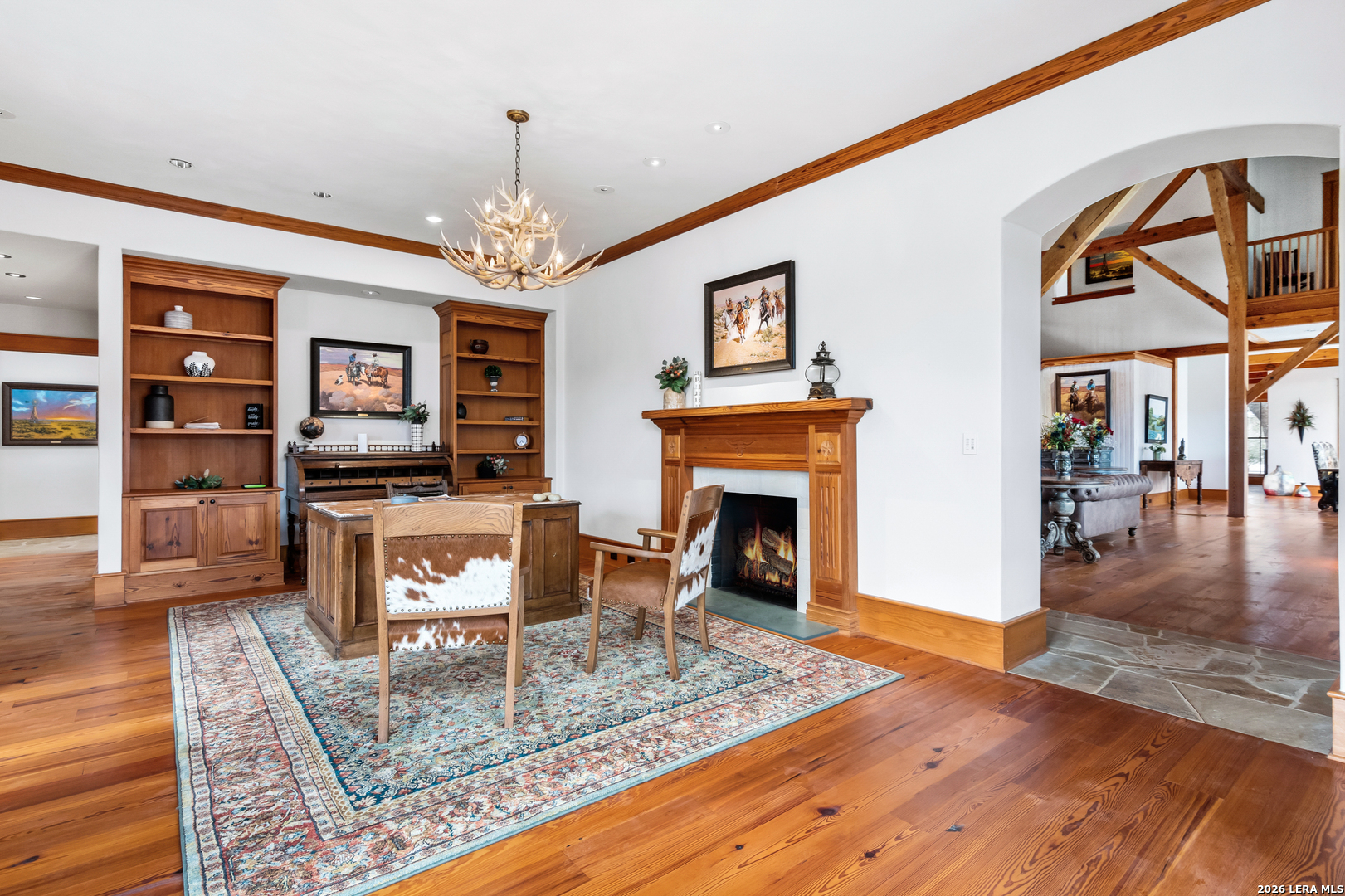 730 Eagle Ridge Road Center Point, TX 78010 - Photo 25 of 50 a living room with furniture a fireplace and a flat screen tv