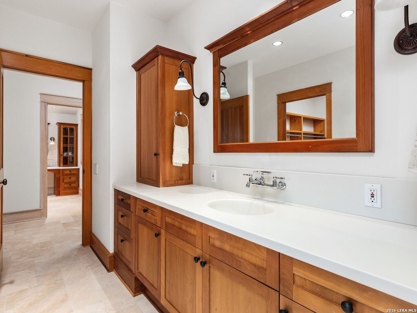 730 Eagle Ridge Road Center Point, TX 78010 - Photo 31 of 50 a bathroom with 2 sink and a mirror
