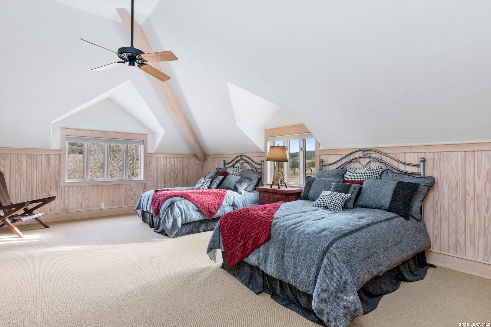 730 Eagle Ridge Road Center Point, TX 78010 - Photo 36 of 50 a bedroom with double bed and a window