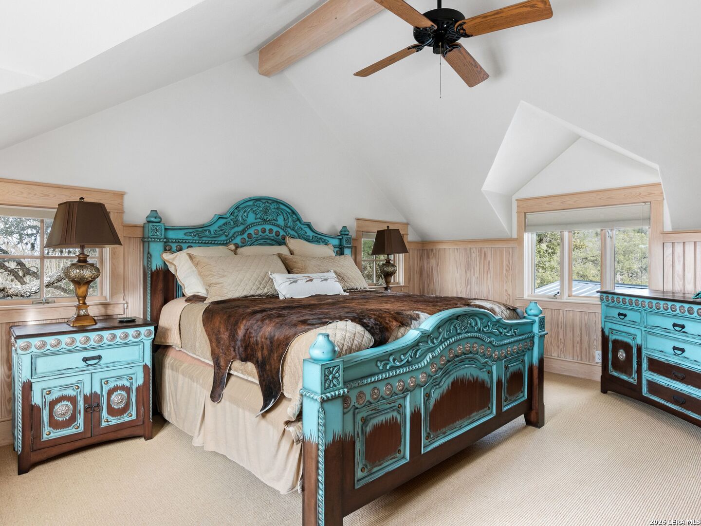 730 Eagle Ridge Road Center Point, TX 78010 - Photo 38 of 50 a bedroom with bed and window