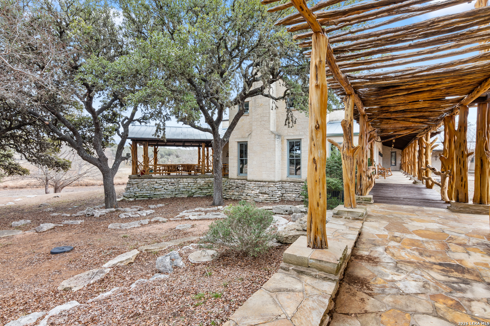 730 Eagle Ridge Road Center Point, TX 78010 - Photo 47 of 50 a view of a house with a yard