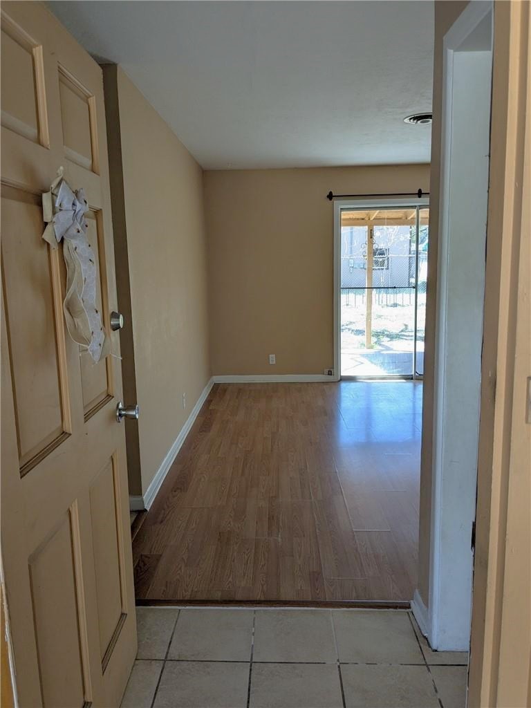 112 Rice Drive Portland, TX 78374 - Photo 3 of 30 wooden floor in an empty room