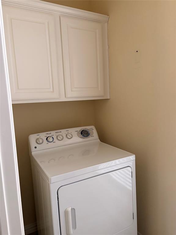 809 Amon Trail Azle, TX 76020 - Photo 12 of 22 a utility room with dryer and washer