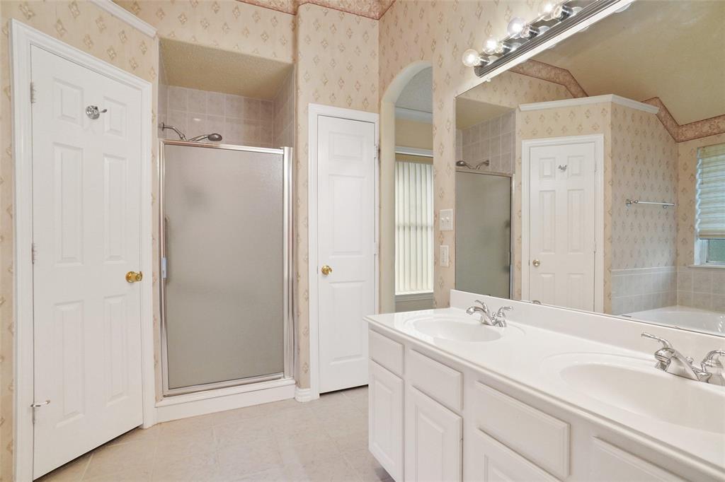 809 Amon Trail Azle, TX 76020 - Photo 15 of 22 a bathroom with a double vanity sink mirror and double