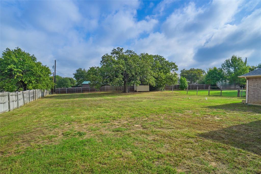 809 Amon Trail Azle, TX 76020 - Photo 21 of 22 a view of a green field